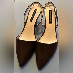 Elevate Your Shoe Collection With These Stunning French Connection Mid Kitten Heel Slingback Shoes. The Pointed Toe And Solid Pattern Make Them Perfect For Both Party/Cocktail And Casual Occasions. The Brown Color And Vegan Leather Upper Material Give Them A Chic And Elegant Look, While The B Shoe Width Ensures A Comfortable Fit. These Shoes Are Perfect For The Summer, Fall, And Spring Seasons And Are Brand New Without The Box. The Slingback Style Adds A Touch Of Sophistication And The Heel Styl Brown Low Heel Slingback Pumps For Party, Brown Closed Toe Slingback Pumps With Branded Heel, Brown Ankle Strap Slingback Pumps For Office, Pointed Toe Heels With Heel Strap For Shopping, Brown High Heel Slingback Pumps With Wrapped Heel, Brown Slingback Pumps With Wrapped Heel, Brown Closed Toe Slingback Pumps With 4-inch Heel, Brown Pointed Toe Slingback Pumps With Wrapped Heel, Brown High Heel Slingback Sandals For Work