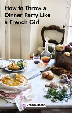 a table with food and wine on it that says how to throw a dinner party like a french girl