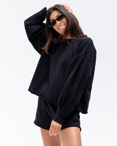 For sport, court and airport— naturally breathable, preshrunk, cozy. This full length sleeve and oversized crew neck makes you look put together but feel like you’re at home, you won’t know how you lived without it. Oversized Comfortable Black Sweater, Comfortable Oversized Black Sweater, Oversized Activewear For Lounging In Fall, Sportswear Sweater With Ribbed Cuffs For Loungewear, Comfy Black Sweatshirt For Loungewear, Comfortable Black Long Sleeve Sweater, Black Top For Lounging In Fall, Oversized Black Sweatshirt For Sportswear, Oversized Long Sleeve Sweats For Sportswear