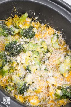 broccoli and cheese casserole in a crock pot with parmesan cheese