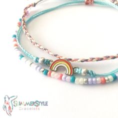 This item is ready to ship! Customization is NOT available for this listing. If you would like something custom, please send me a message! This rainbow wax cord bracelet pack is the perfect gift for the rainbow lover in your life! Completely waterproof, adjustable so it will fit any size wrist. Just pull to close. All of my friendship bracelets are made with 100% cotton embroidery floss & my water proof jewelry is made with 100% waxed polyester cord. Any other supplies I use are all natural Casual Rainbow Bracelets With Sliding Knot, Trendy Adjustable Charm Bracelet For Beach, Adjustable Trendy Charm Bracelet For Beach, Adjustable Beaded Bracelets For Everyday Summer Wear, Everyday Rainbow Jewelry For Summer, Trendy Blue Braided Bracelets For Summer, Blue Braided Trendy Bracelets For Summer, Everyday Summer Rainbow Jewelry, Summer Everyday Rainbow Jewelry