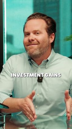 a man sitting at a table with his hands out and the words investment gains in front of him