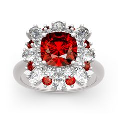 a red diamond surrounded by white diamonds on top of a silver ring with an oval center stone