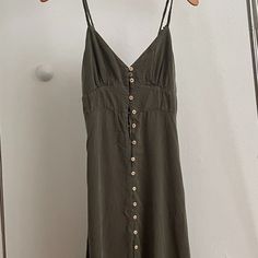 Olive Green/Khaki/Army Green Midi Dress, Linen Button Up Dress From Zara, Braided Straps, Elastic Strap, Button Up, Button Front. Washed But Never Worn! Size S, But Is A Bit Tighter Around The Bust So Would Say Fits Closer To Xs *Small Tear Near Strap, Can Easily Be Fixed At The Tailor Green Buttoned Midi Dress For Vacation, Green Buttoned Maxi Dress For Day Out, Summer Khaki Button Dress, Khaki Buttoned Summer Dress, Green Buttoned Midi Dress For Beach, Green Buttoned Midi Dress For The Beach, Green Midi Dress With Buttons For Beach, Khaki V-neck Dress For Day Out, Chic Khaki Dress With Button Closure