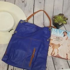 This Is A Gorgeous Genuine Italian Leather Vera Pelle Crossbody Hobo Bag, Boho, Sac, Or Messenger Bag It Can Be Used As A Shoulder Or As A Crossbody Bag Two Open Compartment Inside With One Mid Zippered Compartment, Exterior Zippered Pouch Can Be Used To Store Phones Dimensions Height 16" Width 13 Hand Strap 16.5" Strap Length 35" Blue Bucket Bag With Detachable Handle For Errands, Versatile Blue Bags With Leather Handles, Blue Bags With Leather Handles, Blue Soft Leather Hobo Bag For Travel, Chic Blue Hobo Bag For Errands, Blue Soft Leather Shoulder Bag For Travel, Blue Hobo Bag With Detachable Handle, Blue Hobo Bag With Detachable Handle For Daily Use, Blue Hobo Bag With Detachable Handle For Travel