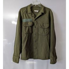 This Vintage Us Army Og-108 Wool Field Shirt Is A Rare Find For Militaria Collectors. Made During The Vietnam War Era, The Shirt Is An Original Piece And Is In Great Shape. It Features A Classic Design With A Button-Up Front, Two Chest Pockets, And Long Sleeves. The Wool Material Makes It Perfect For Cold Weather, And Its Small Size Ensures A Snug Fit. The Shirt Is A Must-Have For Anyone Interested In Military History And Will Make A Great Addition To Any Collection. Shows Some Signs Of It's His Army Field Jacket, Army Jacket, Field Jacket, Military History, Us Army, Vintage 1970s, Army Green, Shirt Jacket, Snug Fit