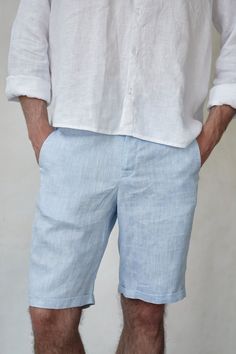 Linen shorts will be a great option for a work in the city or rest on the coast or in the forest. This white & blue melange shorts for men who appreciates sophistication and minimalism. Made of natural linen of the highest quality and flawlessly cut, this thing is suitable for the wardrobe in trendy "old money" style. Made of 100% natural linen, Oeko-Tex certified, free of harmful chemicals. It keeps the temperature of the body + -4 degrees, these clothes are not hot in summer and not cold in winter. Linen allows the skin to breathe, is an anti-allergenic and is not electrified. This is a wear-resistant material and could be washed a lot of times. Custom sizes are available.  Care: Wash at 30-40℃ (104℉) degrees with a gentle cycle with similar colors Do not dry in the sun, lay flat to dry Linen Short Pants For Beach, Casual Linen Bermuda Pants, Casual Bermuda Linen Pants, Beach Linen Shorts, Casual Blue Linen Shorts, White Linen Bermuda Bottoms, Casual Linen Short Leg Pants, Linen Beach Shorts, Relaxed Fit Linen Bermuda Pants