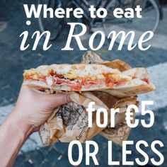 a person holding a sandwich in their hand with the words where to eat in rome for $ 5 or less