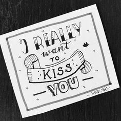 a piece of paper with the words i really want to kiss you on it's side