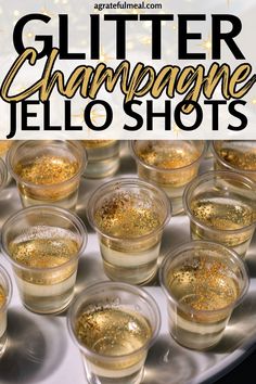 glasses filled with glitter champagne jello shots on top of a tray that says glitter champagne jello shots