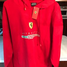 Ferrari Scuderia Hoodie Official Merchandise Size Xl. Brand New With Tags! Red Long Sleeve Sweatshirt With Logo, Red Casual Sweatshirt With Logo Detail, Casual Red Sweatshirt With Logo Detail, Ferrari Scuderia, Ferrari Red, Ferrari, Mens Shirts, Man Shop, Sweatshirts Hoodie