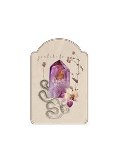 a card with an image of a purple stone and flowers on it, in the middle of