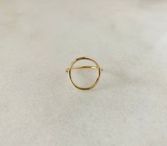 Enjoy this statement piece that will be made to order just for you! Available in gold filled, sterling silver and 14k gold. The band is 1.3mm Open circle is 1.3mm thick and approx. 15mm in diameter. Adjustable 14k Gold Dome Ring For Everyday, Fine Jewelry In 14k Gold Circle Shape, Simple Open Ring For Everyday Wear, Simple Tarnish Resistant Round Band Jewelry, Simple Everyday Open Ring Jewelry, Everyday 14k Gold Full Circle Jewelry, Everyday Full Circle 14k Gold Jewelry, Everyday Stackable Rings In Recycled Gold, Delicate Everyday Metal Ring