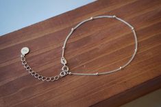 Sterling silver Satellite Bracelet ---Material: Sterling silver ---Bracelet Size: 7 inches, you can also choose to add a 1.5 inches extender, and the size will up to 8.5 inches ---Chain width: 1mm bead size: 2mm ---Really pretty when layered with other bracelets and a terrific addition to any jewelry collection. ---Matching Anklet: https://www.etsy.com/listing/809327614/anklets?ref=shop_home_active_1 Matching Necklace: https://www.etsy.com/listing/941231191/sterling-silver-satellite-18inches?ref Satellite Bracelet, Jewelry Layering Bracelets, Tiny Bracelet, Beaded Chain Bracelet, Jewelry Layering, Bracelet Minimalist, Layered Bracelets, Cute Bracelets, Bracelet Silver