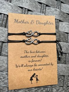 A Mother-Daughter bond is a bond that cannot be broken 👭 Our adorable mother and daughter bracelet set is perfect as a gift or for you to share with your mother or daughter :) A special way for you to think of each other- even when you are apart! 💕 Material - Made of High-Quality Nylon Black Cord and heart charms 💕 Adjustable Size - The length is 4"-11", you can adjust the size through a sliding knot to fit even the largest or smallest of wrists 💕 Heart charms - A little way for you to think Silver Heart Bracelet For Best Friend On Mother's Day, Meaningful Heart Bracelets For Mother's Day, Meaningful Heart-shaped Bracelets For Mother's Day, Mother's Day Heart-shaped Meaningful Bracelets, Heart Charm Bracelet For Friendship And Mother's Day, Mother's Day Heart Charm Bracelet For Friendship, Meaningful Adjustable Bracelets Ideal For Gifting, Meaningful Adjustable Bracelets As Gifts, Heart Bracelet For Best Friend And Mother's Day