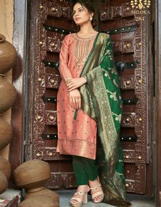 Women Salwar Suit with Jacquard Woven with Swarovski Diamond Work Peach color Processing Time : 5 Business Days Work : Jacquard Woven with Swarovski Diamond Work Fabric: Top : Banarasi Jacquard Bottom : Santoon Dupatta : Banarasi Jacquard Color: Top : Peach Bottom : Dark Green Dupatta : Dark Green #womanfashionsuit #onlinesuits #suitdesignforwomen #salwarsonlineindia #designerindiansuits #designersalwarsuits #designerwomenssuits #femalemodelsinsuits #indiansuitforladies #ladyinsuit Women Salwar Suit, Attractive Dresses, Salwar Kameez Online, Designer Salwar Suits, Suit Pant, Indian Suits, Salwar Kameez Designs, Organza Dupatta, Silk Dupatta