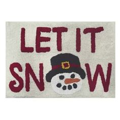 a door mat with a snowman wearing a hat and the words let it snow