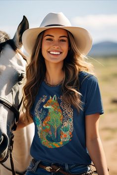 Embrace your free-spirited style with our bohemian style Wolf T-shirt. This enchanting tee features a simple illustration of a Wolf adorned with intricate floral designs, perfect for adding a touch of bohemian flair to your wardrobe. A classic unisex t-shirt that works well with any outfit. Made of a heavier cotton with a double-stitched neckline and sleeves.  Rolled-forward shoulders for a better fit.  Stylish fitted sleeves.  Seamless double-needle collar.  Taped neck and shoulders for durabil Illustration Simple, Free Spirit Style, Fitted Sleeves, Wolf T Shirt, Simple Illustration, A Wolf, Animal Tshirt, Free Spirited, Boho Stil