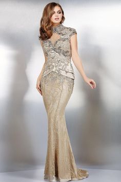 This stunning gown is perfect for any special occasion. Crafted from luxurious lace, embroidered fabric and beaded detailing, this column silhouette will make you look and feel like royalty. The high neckline and cap sleeves beautifully frame the face, while the zipper closure at the back adds a touch of sophistication Motb Dress, Floor Length Lace Dress, Jovani Gown, Evening Dress Collection, Prom 2020, Jovani Dresses, Mother Of Bride, Stunning Gowns, Groom Dress