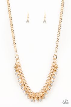 A fringe of glittery rhinestones swings from the bottom of a bold gold chain below the collar for a fierce look. Features an adjustable clasp closure. P2RE-GDXX-274XX Sold as one individual necklace. Includes one pair of matching earrings. Happy Jewelry, Dainty Band, Coil Bracelet, Gold Jewelry Necklace, Paparazzi Accessories, Paparazzi Jewelry, Stunning Necklace, Necklace Earring Set, Pendant Earrings