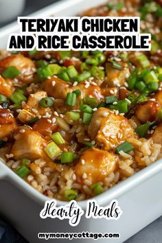 teriyaki chicken and rice casserole in a white dish with green onions