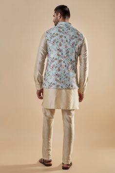 Light blue cotton silk bundi jacket with floral print. Comes with beige pant and a kurta. - Aza Fashions Spring Designer Cotton Silk Nehru Jacket, Unstitched Cotton Nehru Jacket For Spring, Fitted Cotton Silk Nehru Jacket For Spring, Fitted Nehru Jacket In Cotton Silk For Spring, Fitted Cotton Nehru Jacket For Spring, Kurta Set Men, Nehru Jacket, Beige Pants, Kurta Set