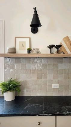 the kitchen counter is clean and ready to be used as a shelf for cooking utensils