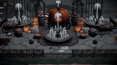 an animated halloween scene with pumpkins and candles