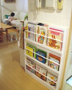 children's bookshelf in the corner of a room