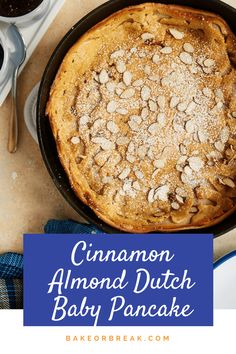 cinnamon almond dutch baby pancake in a cast iron skillet