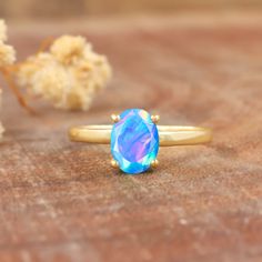 Blue fire Ethiopian opal ring for women, minimalist ring, October birthstone, AAA Ethiopian opal ring, 925 Sterling silver ring, Gold ring, gift for her. *Other Similar Jewelry Available Here* https://www.etsy.com/shop/AreebaJewelry Details:- Gemstone - Ethiopian opal  Stone Color - Natural  Stone Setting - Prong Quality - AAA Grade Rize Size - 4 US TO 9 US Available Type - 100% Natural  Shipping service - Free worldwide shipping service About AreebaJewelry:- AreebaJewelry takes great pride in t Minimalist Opal Birthstone Promise Ring, Minimalist Opal Rings With Gemstone, Blue Opal Promise Ring, Minimalist Opal Rings For Gifts, Minimalist Opal Rings For Gift, Minimalist Opal Ring As A Gift, Minimalist Opal Rings With Birthstone, Minimalist Opal Ring With Birthstone, Minimalist Opal Birthstone Ring For Anniversary