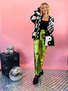 Shine like the night sky in these out-of-this-world LET YOURSELF SHINE METALLIC PANTS! With their high-waisted fit and green metallic design - these pants will instantly elevate any outfit. Let your fashion sparkle and shine with these trend-setting trousers! -The coolest metallic pants we've ever laid eyes on! 👽 -High waisted fit with boot cut pant leg -Front and back pockets -Basically makes ANY outfit look 10 x's cooler! -95% Polyester; 5% Elastane SIZING: The pants are more of a rigid fit. Iridescent Pants Outfit, Metallic Green Pants, Pink Metallic Pants Outfit, Metallic Pants Outfit, Green Jacket Outfit, Boot Cut Pant, Metallic Pants, Metallic Design, Oversized Knit Cardigan