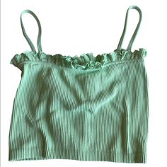 Zara Brand Mint Colored Crop Top. Spaghettis Straps And Ribbed Material. Ruffled Top. Polyamide/Elastane Blend For A Stretchy Comfortable Fit! Perfect Worn Alone Or As A Layering Piece! Nwt! Size Xs-S Spring Crop Top With Spaghetti Straps And Ruffles, Fitted Green Camisole For Summer, Green Cotton Camisole Crop Top, Green Seamless Spaghetti Strap Top, Trendy Stretch Camisole For Spring, Spring Ruffle Cami Crop Top, Spring Ruffled Cami Crop Top, Spring Seamless Crop Top For Day Out, Seamless Crop Top For Day Out In Spring