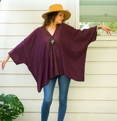 Embrace effortless boho style with our Raw Natural Cotton Gauze Blouse. This oversized cotton summer top combines minimalist design with comfort, making it an essential piece for your wardrobe. Handmade with care, this tunic is perfect for casual events, lounging, or summer days. Key Features * Boho Minimalist Design: Featuring a chic, oversized style with a stylish V-neck and asymmetrical hemline. * Premium Material: Made from raw natural crinkled cotton gauze, offering a soft and breathable feel. * Handmade: Each blouse is handmade, ensuring unique craftsmanship and attention to detail. * Eco-Friendly Shipping: Ships from Texas, reducing the carbon footprint and ensuring faster delivery times. * Woven Accents: Woven front and back accents add texture and a unique touch to the blouse. Siz Loose Fit Beach Tunic Top, Bohemian V-neck Blouse With Relaxed Fit, Bohemian Relaxed Fit V-neck Blouse, Bohemian V-neck Relaxed Fit Blouse, Oversized Tunic Lagenlook Blouse, Bohemian Oversized V-neck Top, Lagenlook Oversized Tunic Blouse, Relaxed Cotton Blouse For Vacation, Free Size Cotton Tunic