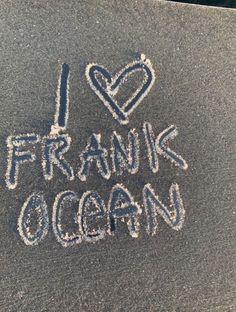 i love frang ocean written in chalk on the ground with white writing and hearts