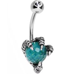 a belly ring with an aqua colored stone in the shape of a crab on it's side