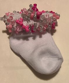 Custom handmade beaded socks, available to custom order any size, color or variation. Fit for adults and children! I am a mother and grandma, I have been making and selling "Sassy Sox" for over 30 years. They are great for shower gifts, sports teams, group events and for matching daily outfits! Handmade White Socks For Gifts, Handmade White Socks For Gift, Handmade White Socks As Gift, Beaded Socks, I Am A Mother, Group Events, Cute Friend Photos, Sports Teams, Kids Socks