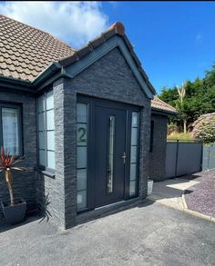 WOW! We love this modern looking door. The Select Long Rectangle in Anthracite Grey and Aurora glass completes the contemporary look for the front of this home. 

#GreyDoor #FrontDoor #NewFrontDoor #GreyFrontDoor #HomeRenovation #HomeImprovements #HomeIdeas #HouseIdeas #HomeInspo #HomeandGarden #ModernHome Grey Front Door, Contemporary Front Doors