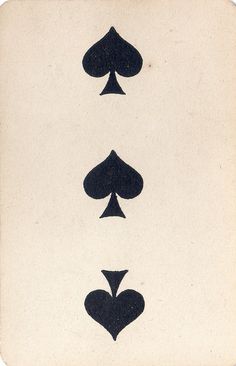 four card suits with hearts and spades on the front, all in black against a white background