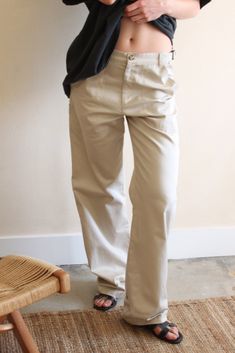 The Ingrid Carpenter Pant is crafted with 100% imported Japanese cotton, providing a lightweight, structured feel. Featuring classic patch pockets, finished belt loops and adjustable side adjusters, this pant offers a relaxed sophistication. Featuring Japanese cotton construction and tailored details, the Ingrid Carpenter Pant combines modern styling with comfort and reliability. Style the Ingrid Carpenter Pant for any occasion, from day to night, by wearing it with your favorite flat or heel. C Neutral Wide Leg Bottoms For Everyday, Everyday Cotton Pants With Belt Loops, Tapered Leg Pants With Belt Loops For Everyday, Classic Everyday Cotton Cargo Pants, Relaxed Fit Chino Cotton Twill Pants With Belt Loops, Everyday Cotton Wide-leg Cargo Pants, Beige Bottoms With Welt Pockets For Everyday, Chino Cotton Twill Straight Pants For Work, Straight Leg Chino Cotton Twill Cargo Pants For Work