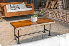 a coffee table with a potted plant on it