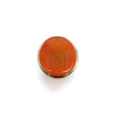 This is a spectacular carved carnelian 14 karat gold signet ring. It is part of Kirsten's Corner signature line. Starting with a beautifully carved carnelian intaglio, a simple but sophisticated 14 karat gold bezel set mount was designed. The carnelian Intaglio tablet measures 26mm x 22mm x 5mm and is bezel set. The ring has a sleek modern profile and works well as a unisex ring. The ring weighs 20.6 grams and is a size 7 1/2. It can be resized up of down a size or two.  The image on the intaglio is complex, composed of many parts. The amorial bearing pictures drapery held up by floral bouquets. In front of that is shield with a lamb holding a flag (the figure of a lamb carrying a cross and standing on a mount is the sign of Christ crucified); or Agnus Dei with the vexillum. Below the lamb Classic Carnelian Signet Ring For Formal Occasions, Classic Carnelian Signet Ring For Formal Events, Formal Carnelian Signet Ring With Polished Finish, Yellow Gold Carnelian Signet Ring Gift, Gold Carnelian Signet Ring With Polished Finish, Yellow Gold Carnelian Signet Ring As A Gift, Gift Carnelian Yellow Gold Signet Ring, Gift Carnelian Signet Ring In Yellow Gold, Formal Carnelian Oval Signet Ring