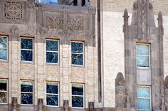 an old building with many windows on the side