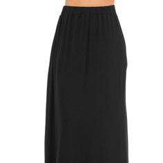 Standout Style Is Easy To Achieve With This Sashaying Skirt. Its Fold-Over Waist With Pockets On The Side That Make A Comfortable Fit, While Lightweight Fabric Falls To An Airy, Ankle-Kissing Hem. All Sizes Available 95% Rayon, 5% Spandex Hand Wash, Hang Dry Made In Usa Black Relaxed Maxi Skirt, Relaxed Black Maxi Skirt, Versatile Black Midi Skirt, Versatile Black Lined Skirt, Versatile Black Skirt Bottoms, Versatile Black Stretch Maxi Skirt, Versatile Black Flowy Skirt, Versatile Black Long Skirt, Casual Black Lined Maxi Skirt