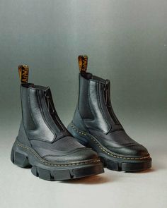 Find DR. MARTENS 2976 Dmxl Platform Chelsea Boots on Editorialist. A new era begins. The 2976 Chelsea boot reworked and reimagined. An experiment that questions the nature of our traditional silhouettes and recontextualises our industrial design history through a modernist lens. Retaining the classic slip-on elasticated gussets with the addition of a front facing water-resistant AquaGuard zip enclosure. The Chelsea boot form has been distorted with contrasting material panels to create textural 2976 Chelsea Boots, Dr Martens 2976, Platform Shoes Sandals, Lightweight Boots, Platform Chelsea Boots, Patent Boots, Botas Chelsea, Yellow Heels, Dr Martens Boots