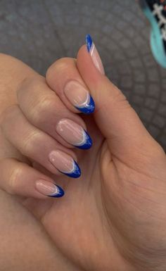 There's a new beauty trend taking over Instagram and it's absolutely stunning. Say hello to "quartz nails". Cute Nails With Blue Dress, Homecoming Nail Ideas Simple, Hoco Nails For Navy Blue Dress, Dark Blue And White French Tip Nails, Dip Tips Nails Ideas, Blue French Tip Nails With White Line, Duke Blue Nails, Megan Moroney Nail Ideas, Blue Crome Nails Acrylic Almond