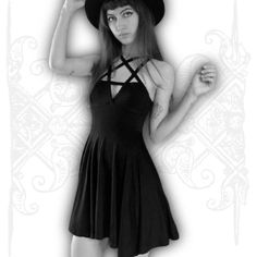 Silhouette: A-LINE Neckline: Halter Sleeve Style: Spaghetti Strap Decoration: Hollow Out Style: Gothic Dresses Length: Above Knee, Mini Material: Polyester Material: Spandex Sleeve Length(cm): Sleeveless Waistline: Natural Pattern Type: Solid Pentagram Dress - Be a little bad. This deep black dress features a beautiful pentagram neckline, designed to make you feel like a goddess. It has a high-low hemline, with a zipper closure at the back. This dress is made of soft, comfortable fabric, and is Gothic Mini Dress For Summer, Summer Gothic Mini Dress, Gothic Black Mini Dress With Straps, Fitted Gothic Mini Dress For Summer, Black Stretch Halter Dress For Summer, Summer Black Stretch Halter Dress, Gothic Fitted Summer Dresses, Gothic Stretch Mini Dress For Summer, Fitted Strappy Halter Dress For Summer