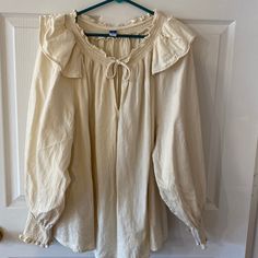 An Old Navy Peasant Top Never Worn Size 3xl Cream Long Sleeve Peasant Top For Daywear, Long Sleeve Beige Peasant Top For Daywear, Beige Long Sleeve Peasant Top For Daywear, Beige Peasant Cotton Blouse, Beige Cotton Peasant Blouse, Beige Cotton Peasant Top, Beige Long Sleeve Cotton Peasant Top, Peasant Style Beige Blouse For Daywear, Cream Bohemian Peasant Top For Daywear