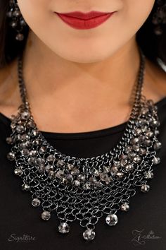 The NinaInterlocking gunmetal links join into a tapered mesh down the chest. Featuring a sparkling faceted surface, glittery crystal-like beading swings from the top and bottom of the fierce palette for a hypnotizing finish. Features an adjustable clasp closure.Sold as one individual necklace. Includes one pair of matching earrings. RETIRED COLLECTION This piece is no longer made, and is currently available in Limited quantities. Get Yours Now! Faceted Gems, Jewelry Catalog, Trendy Fashion Jewelry, Paparazzi Accessories, Black Necklace, Paparazzi Jewelry, Necklace Earring Set, Metal Beads, Matching Earrings