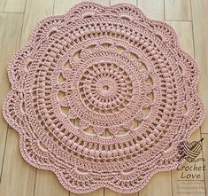 a crocheted doily is shown on the floor